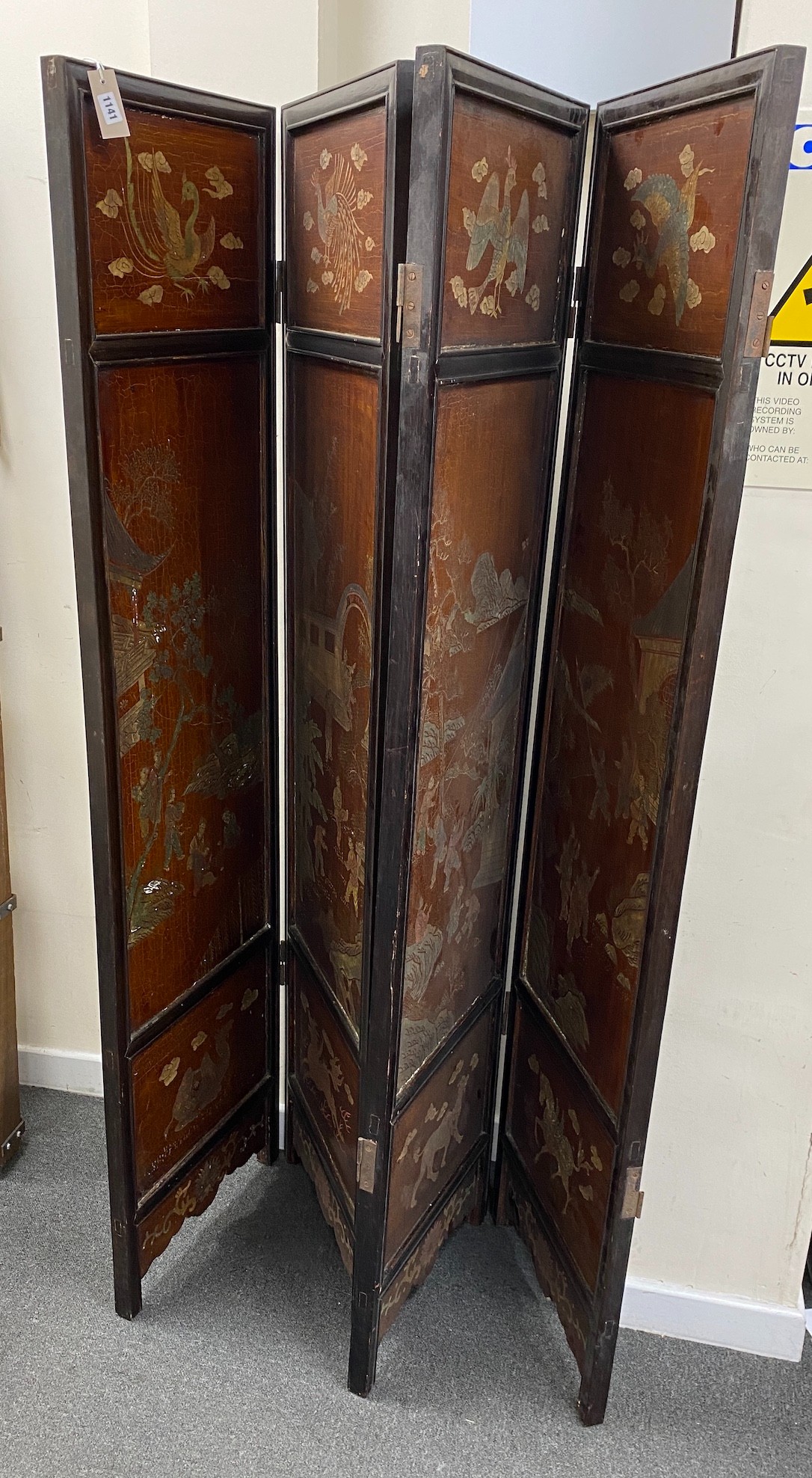 A Chinese four fold screen, each panel width 48cm, height 184cm